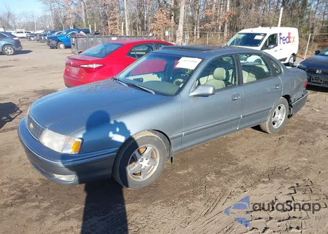 1999 Toyota Avalon Xls z USA, uszkodzony, nr VIN 4T1BF18B6XU303172
